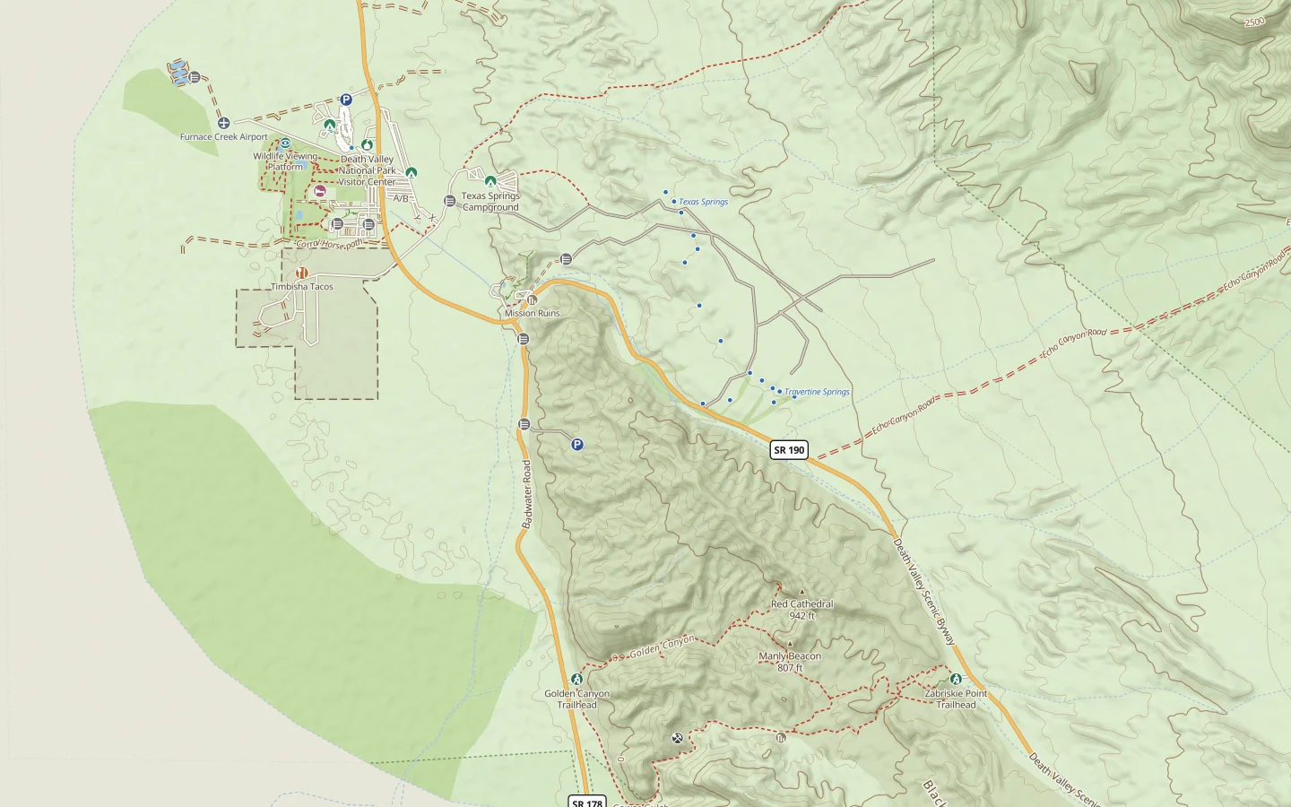 The Overland topo map over Furnace Creek, Death Valley — the visitor
              center, campgrounds and airstrip at top left, springs strung along the
              wash, and the road running southeast past Golden Canyon to Zabriskie
              Point, with 4WD roads picked out in red.